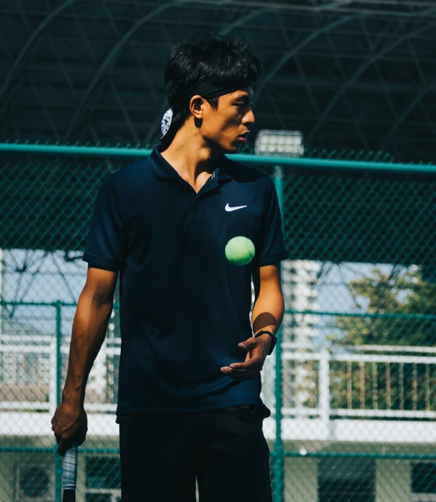 Personal trainer with a client on court